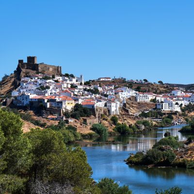Cover art: riverside village in northern Portugal — photo by Nils Rotura on Pexels
