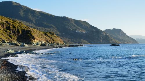 Free Stunning seaside cliffs and ocean in Ogliastro, Corse, France. Stock Photo