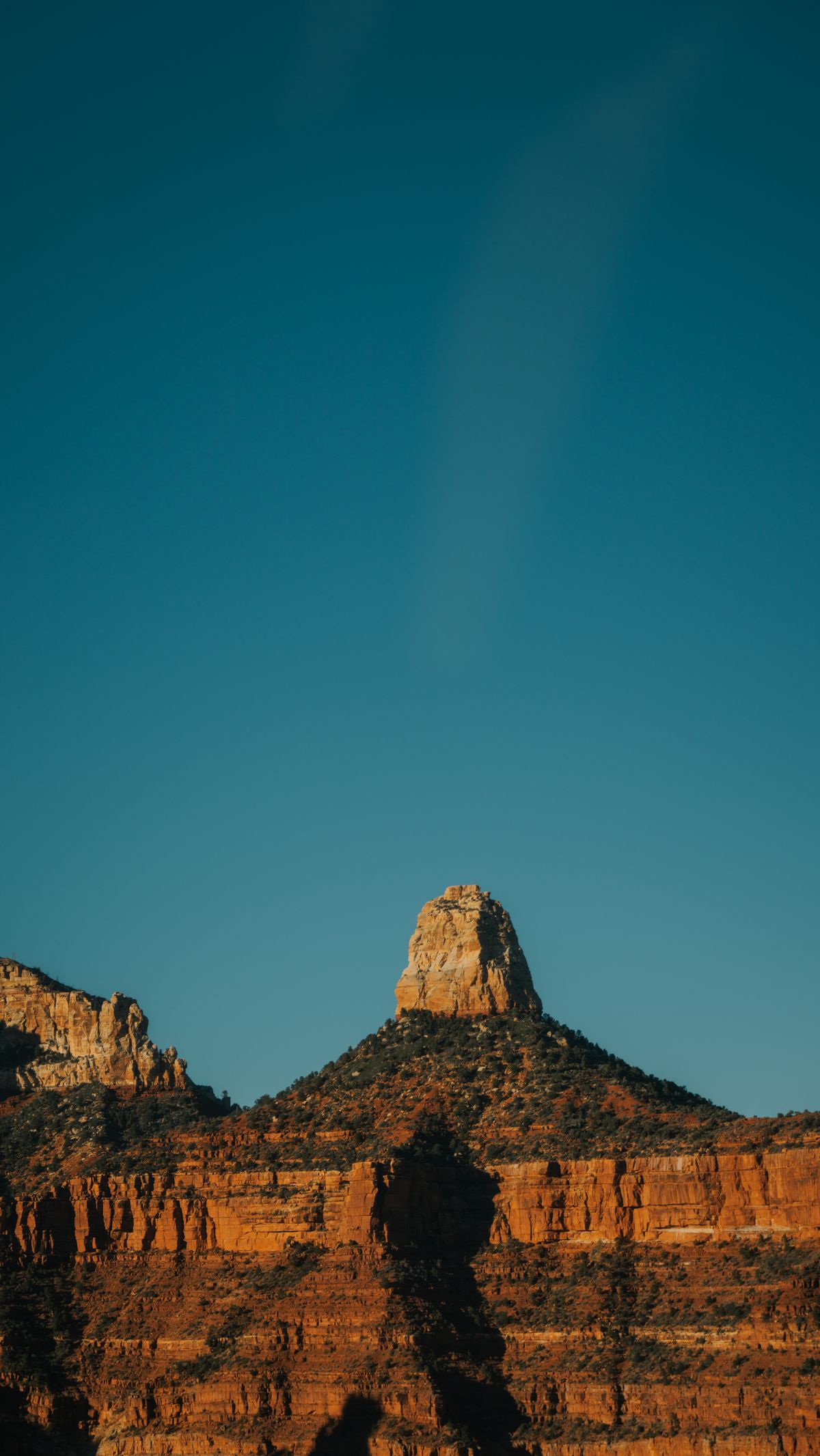 Majestic Red Rock Formation Against Clear Sky · Free Stock Photo
