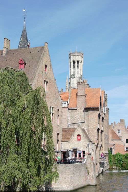 Free Charming Bruges landscape featuring the iconic belfry and serene canals. Stock Photo