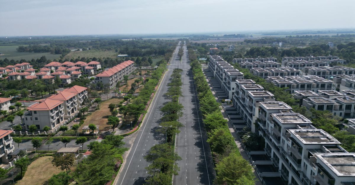 Aerial photograph of a sprawling residential area in Dong Nai, Vietnam showcasing modern architecture and wide roads.