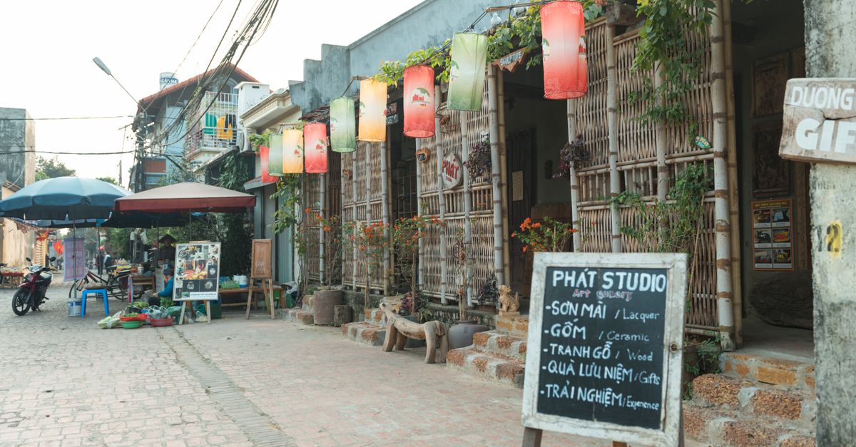 Hanoi Old Quarter with hanging lanterns and colonial architecture