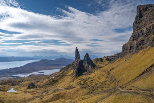 Free Breathtaking view of Old Man of Storr on a sunny day in Scotland, featuring dramatic rock formations. Stock Photo