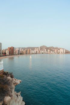 A serene view of the Benidorm skyline from a vantage point, showcasing the city's coastal beauty.