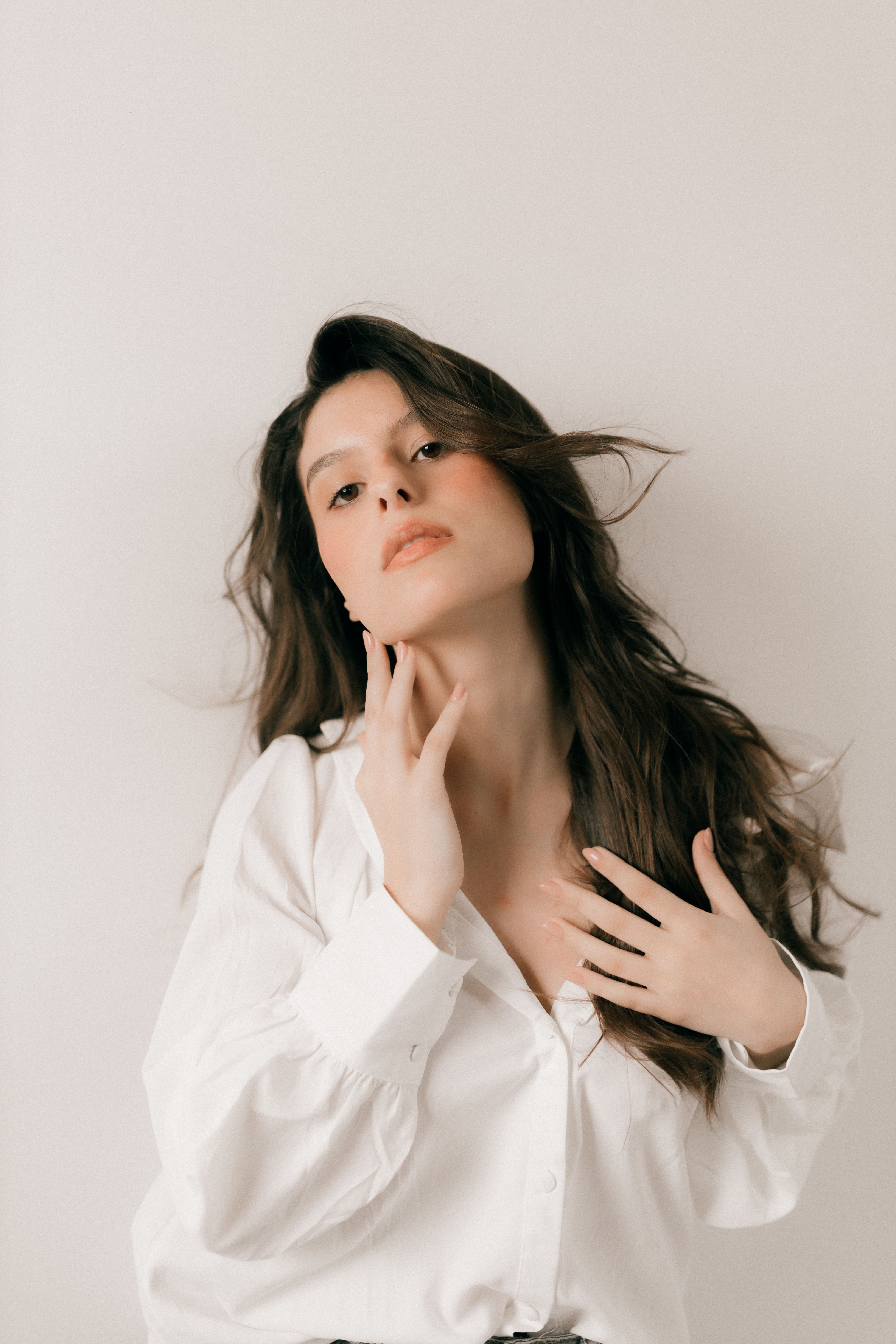 Elegant Portrait of a Woman in White Shirt · Free Stock Photo