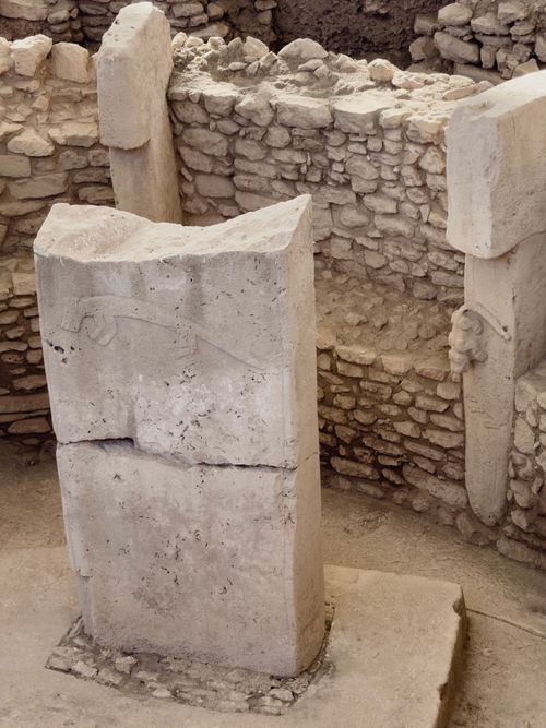 Free Stone pillars with carvings at Göbekli Tepe in Şanlıurfa, Türkiye. Stock Photo