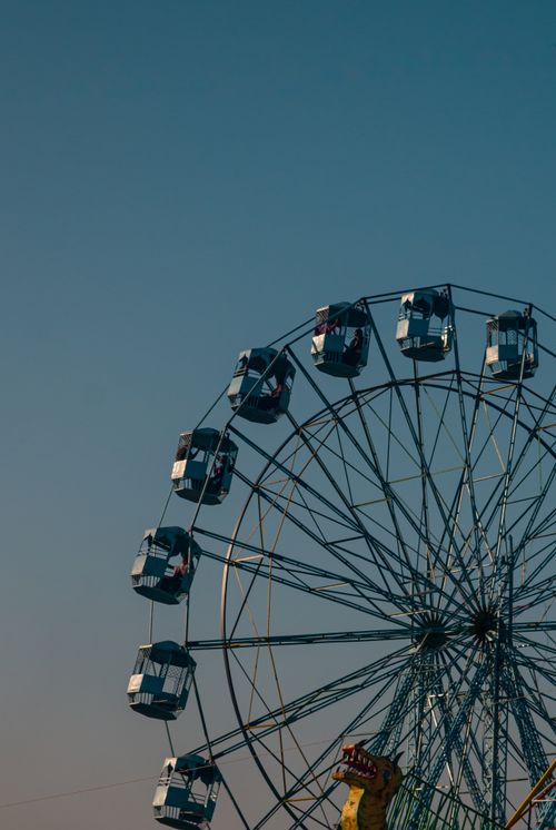 Free A stunning Ferris wheel captured against a clear evening sky in Nepal, offering a serene and captivating view. Stock Photo