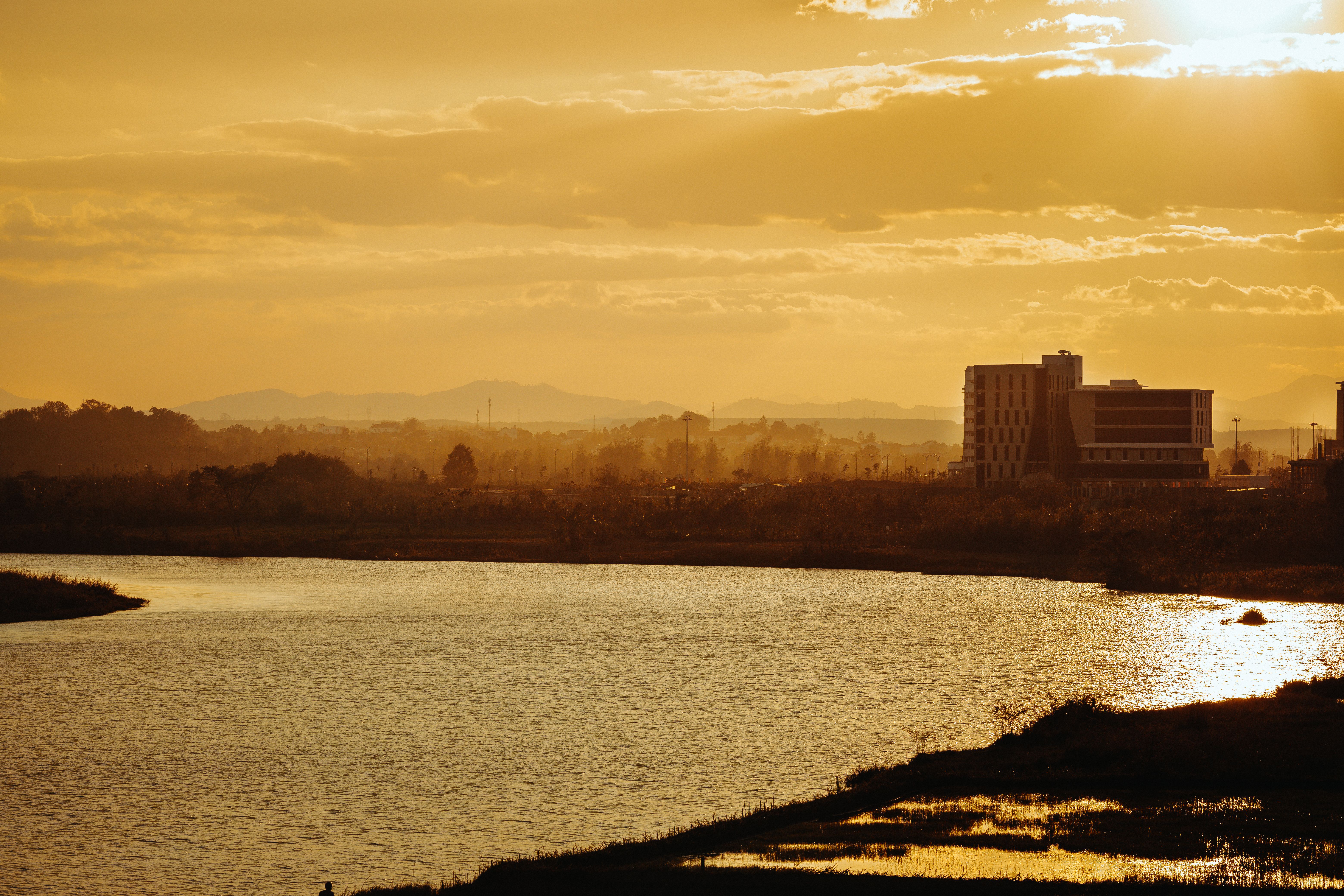 Scenic Sunset Over Kon Tum River Landscape · Free Stock Photo