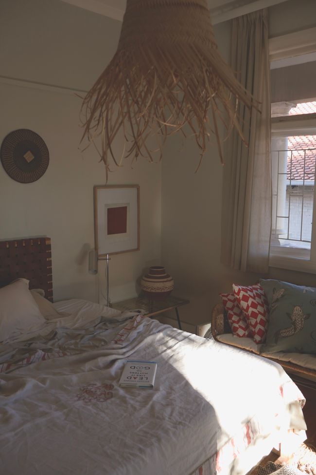 Naturally styled bedroom with linen bedding and soft daylight