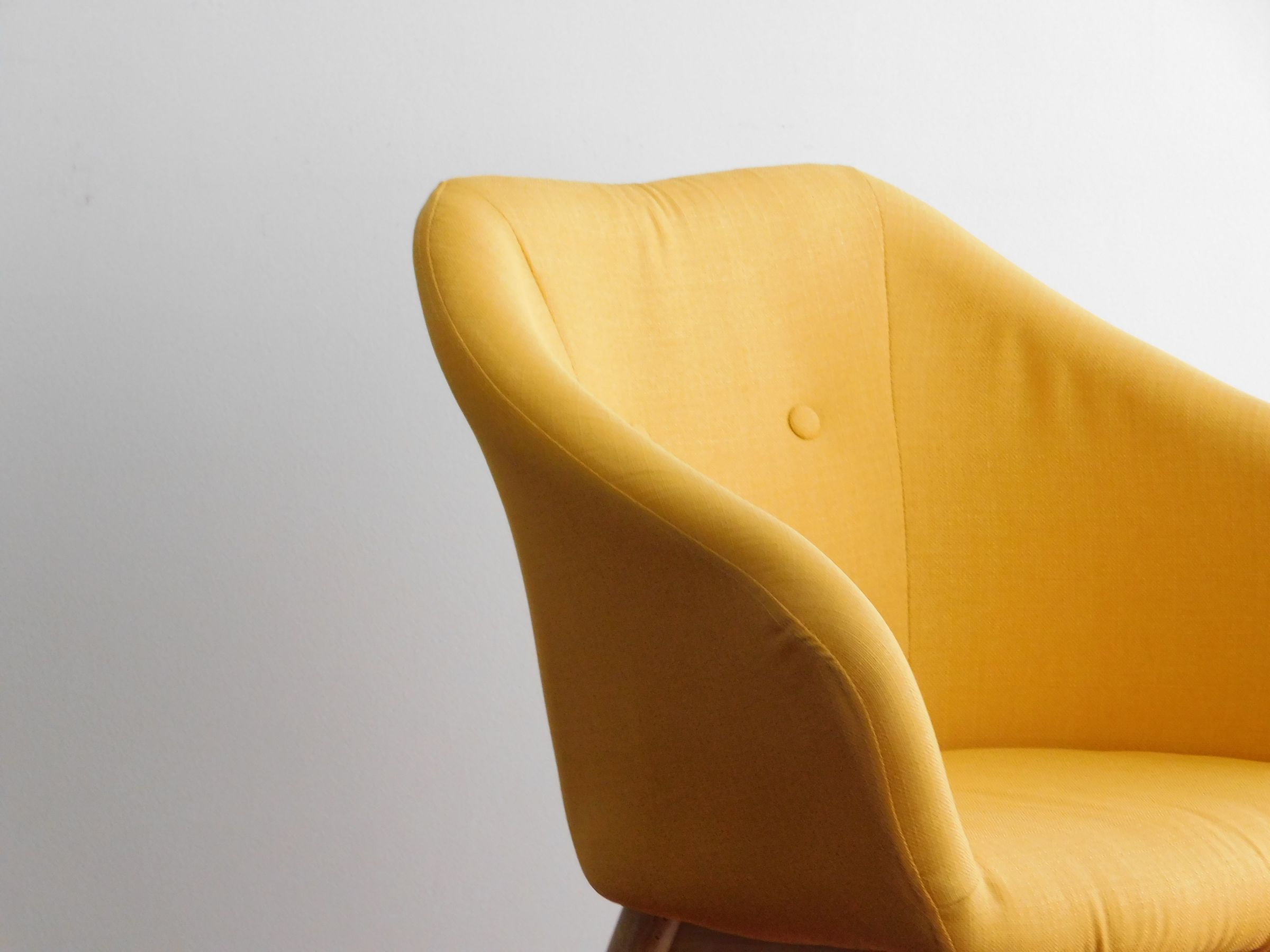 Bright yellow modern armchair