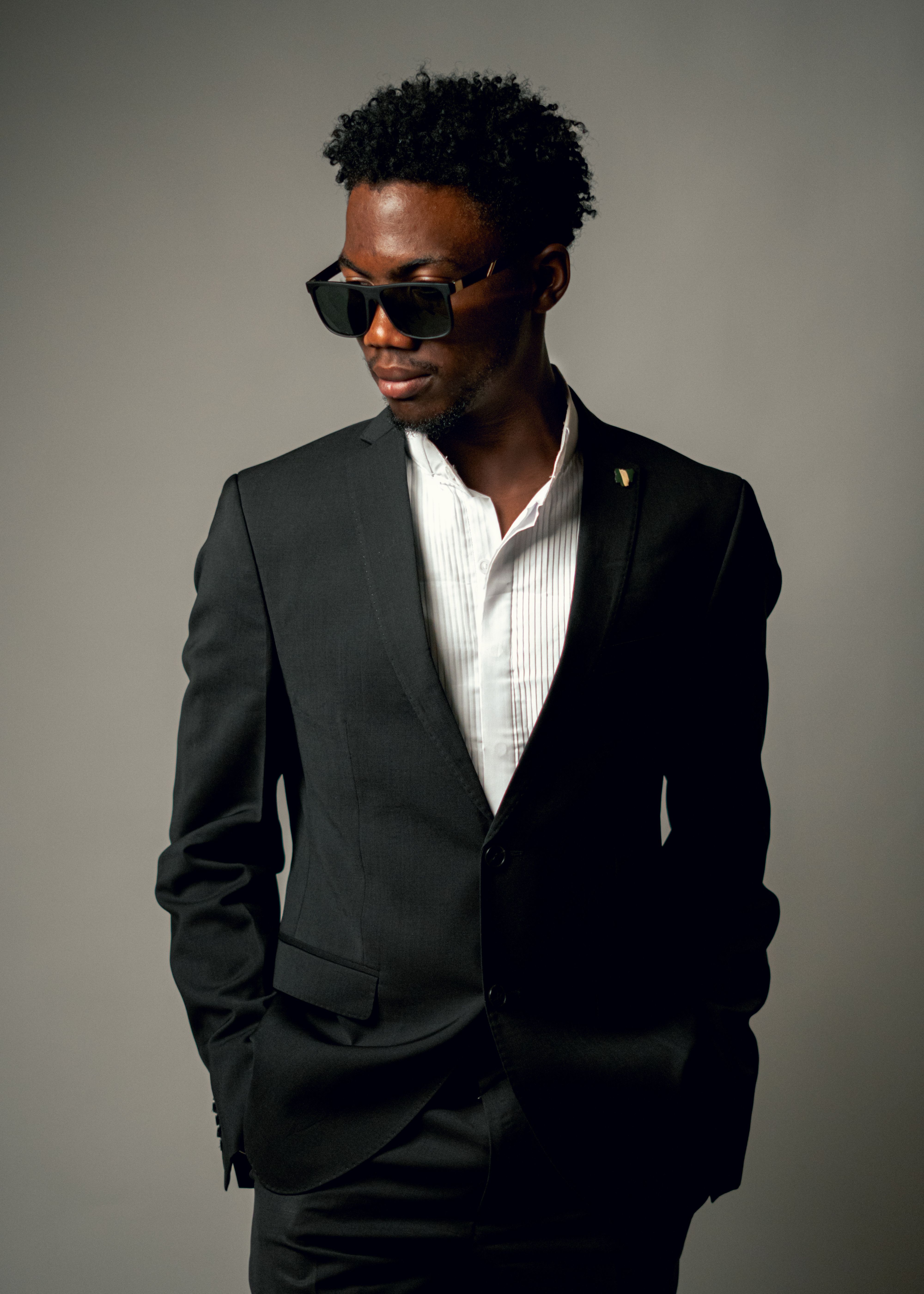 Stylish Man in Black Suit with Sunglasses · Free Stock Photo