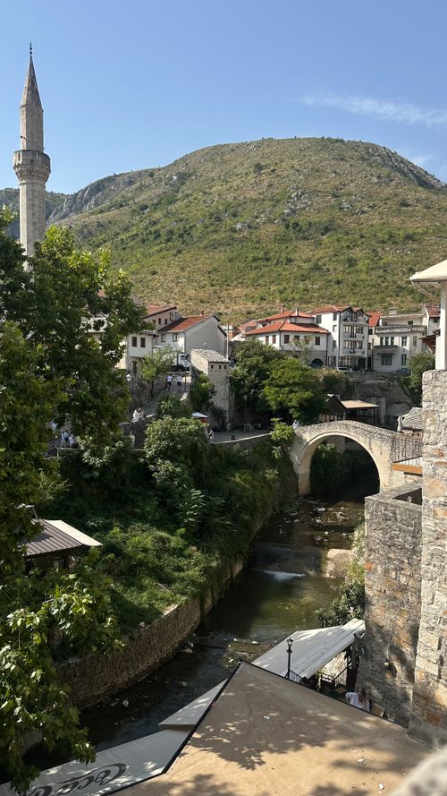 Free Charming view of Mostar showcasing historic Ottoman architecture and beautiful landscape. Stock Photo