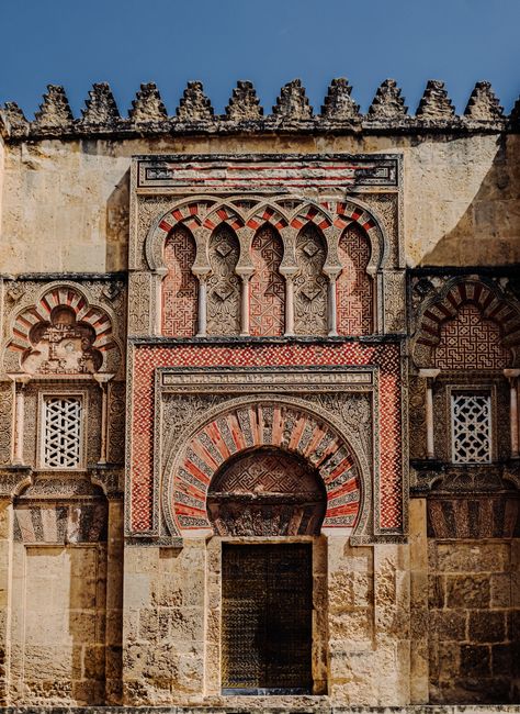 Detailed facade of Moorish architecture in Córdoba, highlighting Andalusian design.