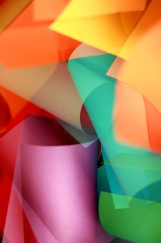 Vibrant abstract image featuring colorful paper shapes in artistic composition.