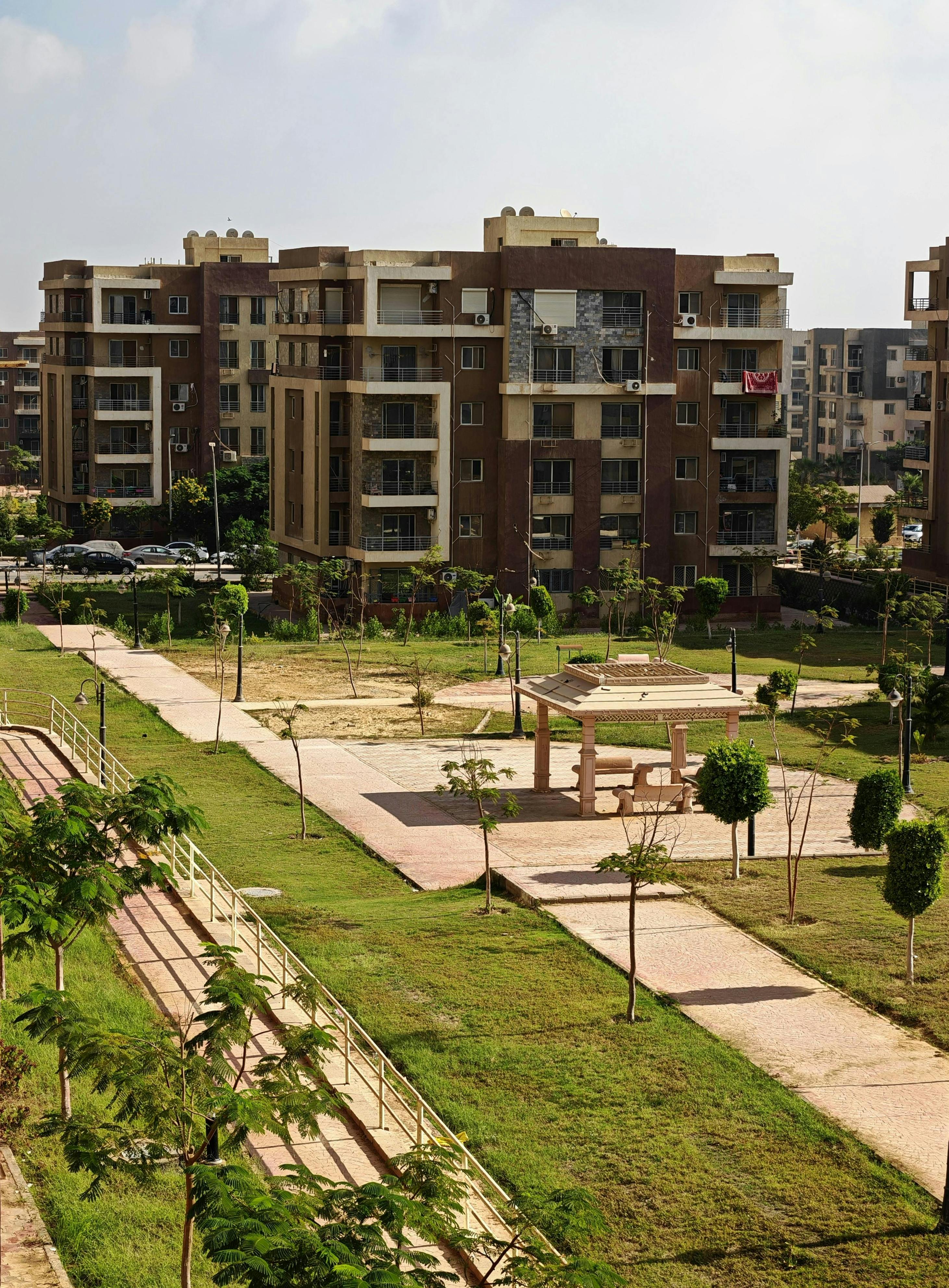 modern residential complex with green landscape