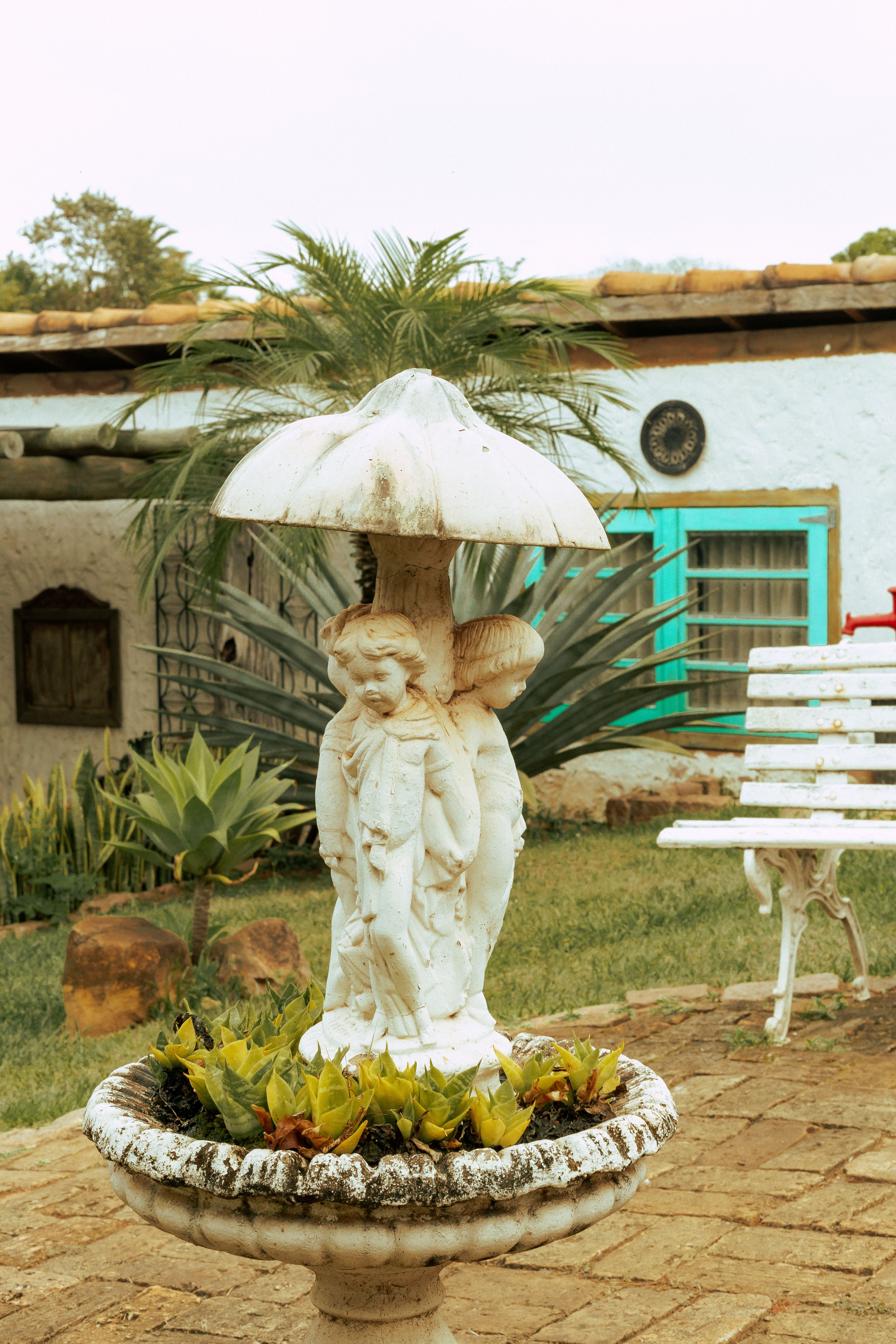 Elegant Angel Statue in Tranquil São Paulo Garden · Free Stock Photo