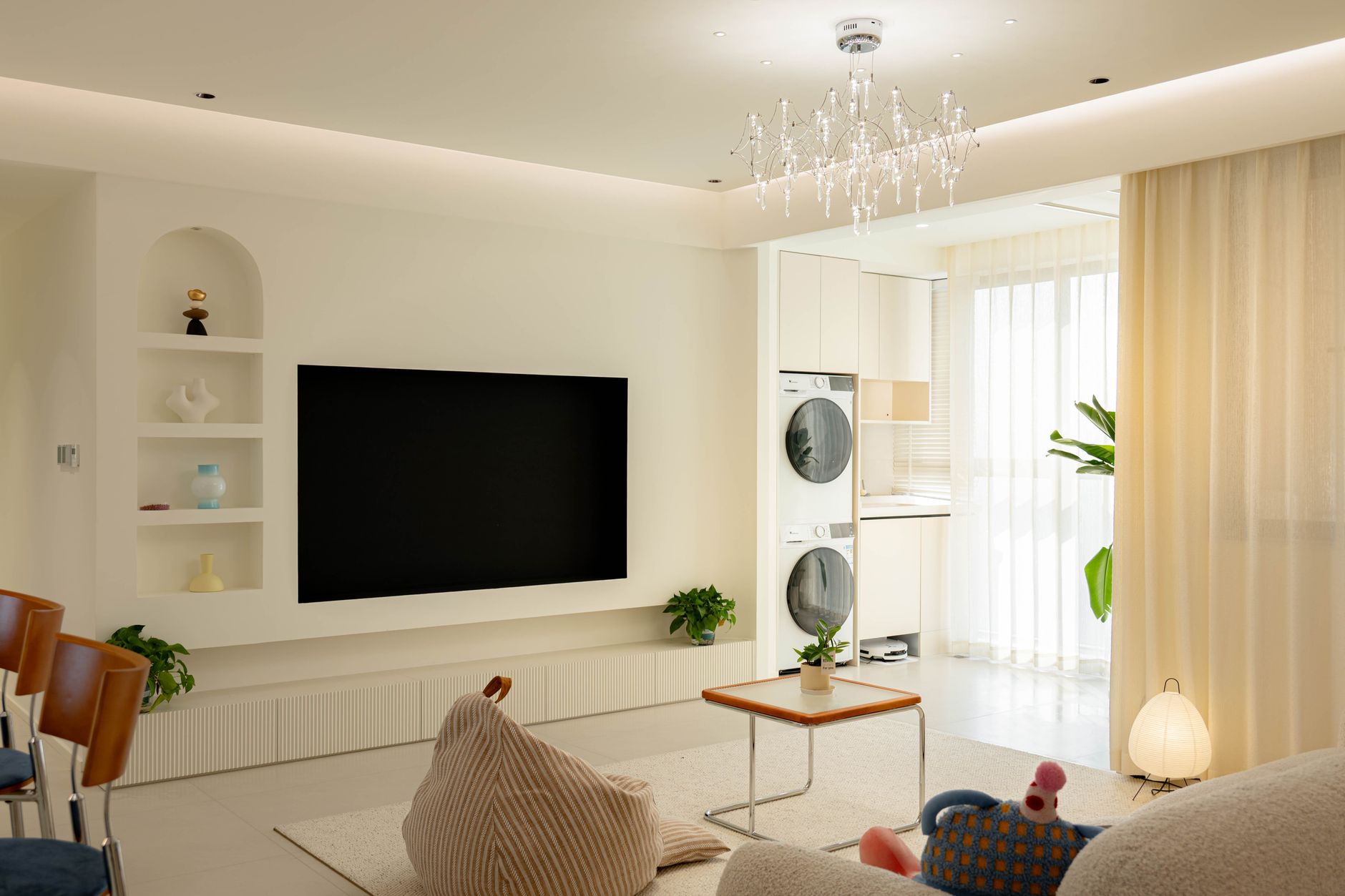 Bright and elegant minimalist living room with modern decor and natural light.