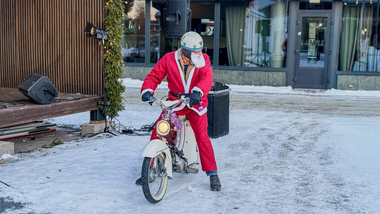 Sta Claus Ride Santa Claus Riding Scooter in Winter Wonderland · Free Stock Photo