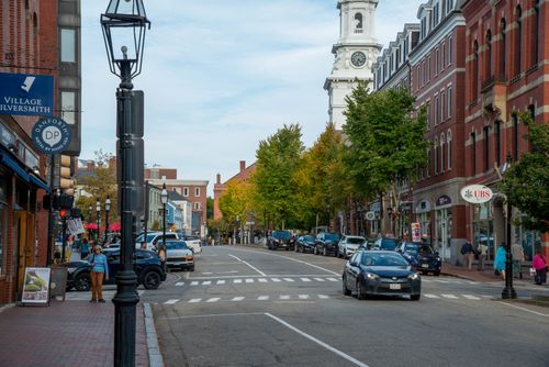 Free Charming street scene in Portsmouth, featuring historic architecture and local businesses. Stock Photo