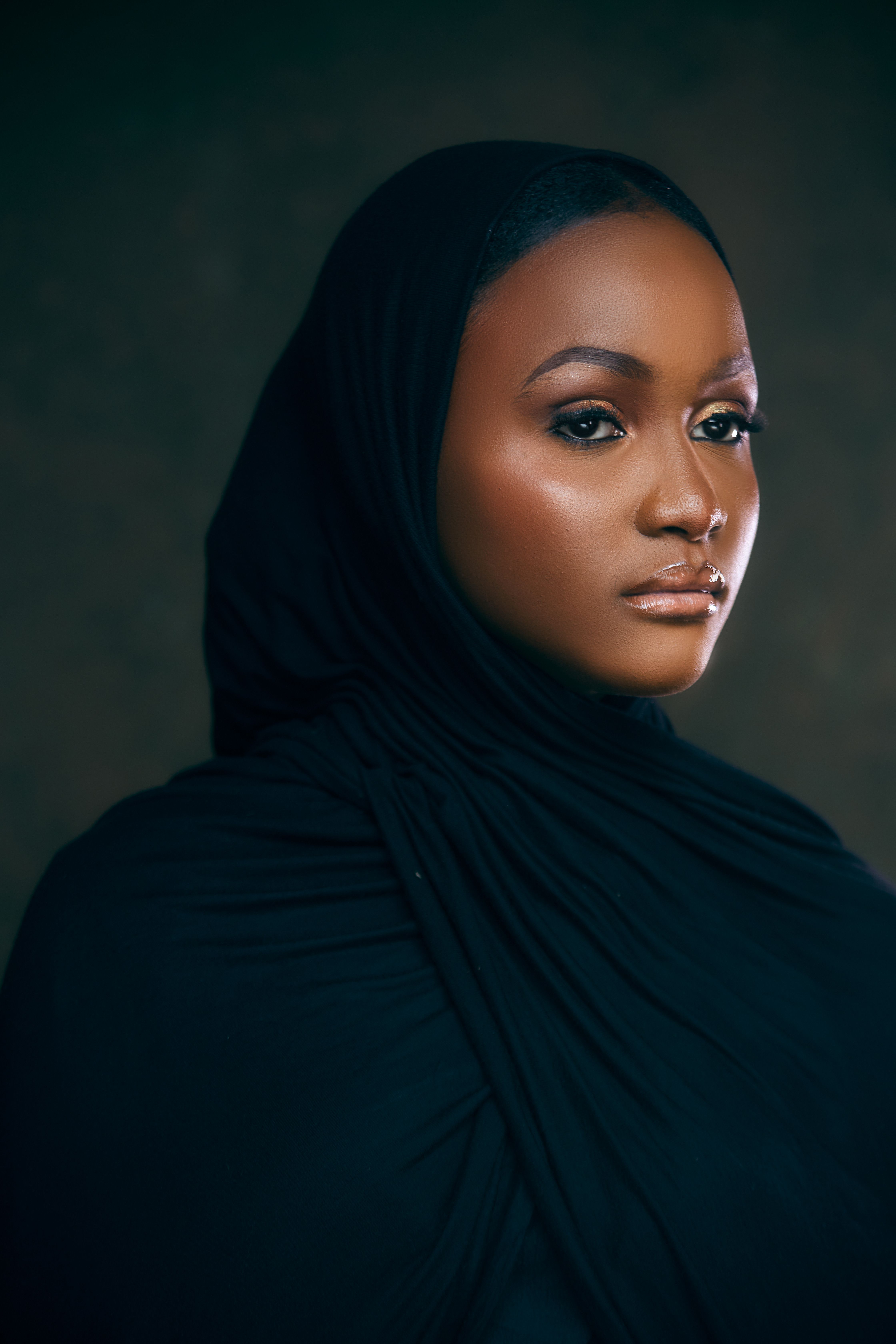 Elegant Portrait of a Woman in Black Hijab · Free Stock Photo