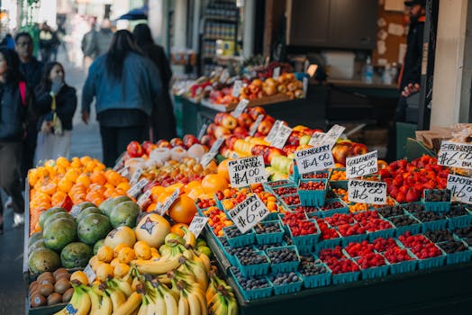 Colorful array of fruits at Seattle market, showcasing local produce and vibrant street life.