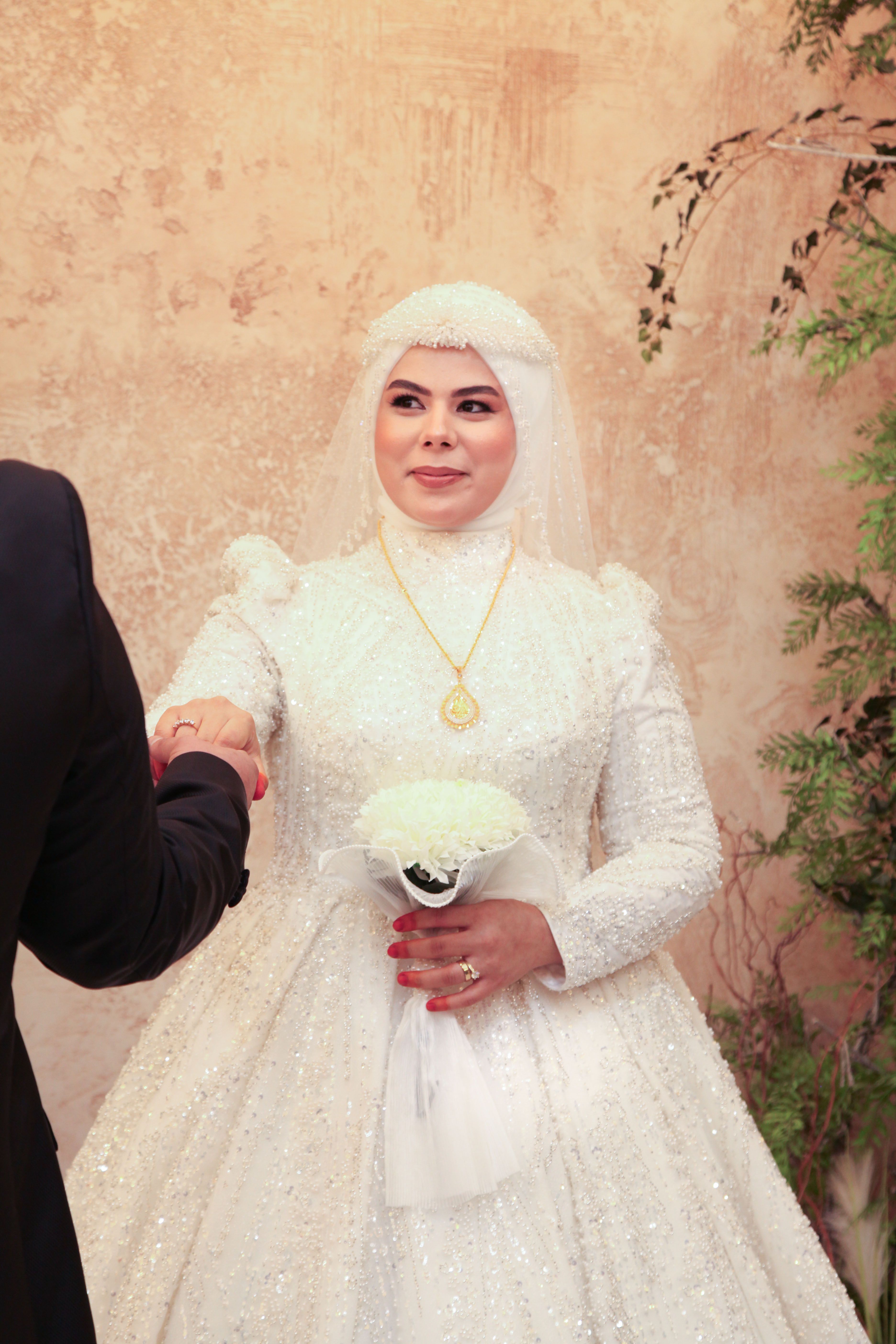 Elegant Middle Eastern Bride in White Wedding Dress