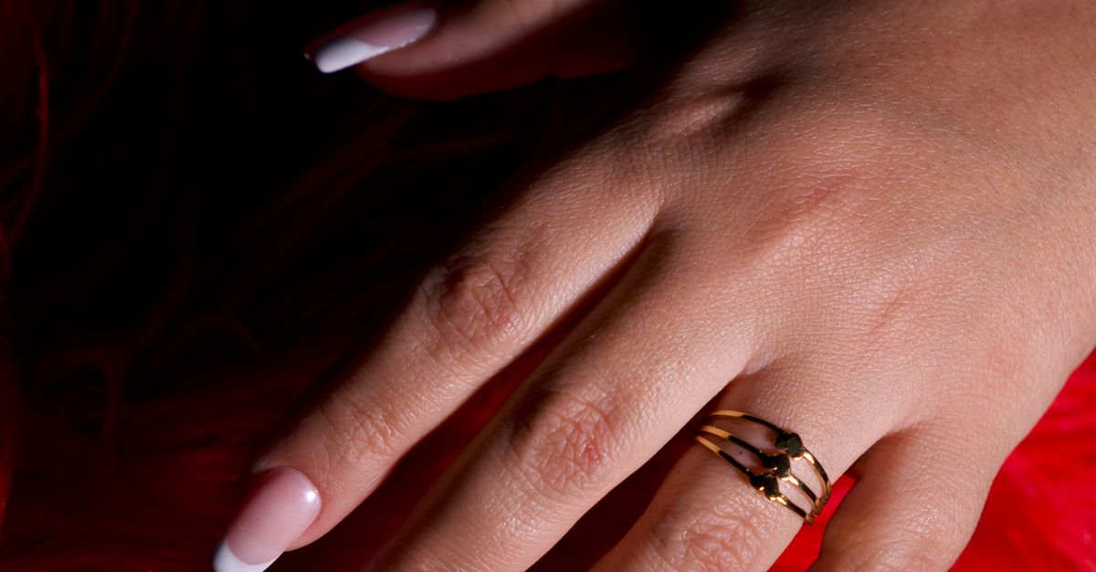 Close-up of Hand with Elegant Manicure and Ring · Free Stock Photo