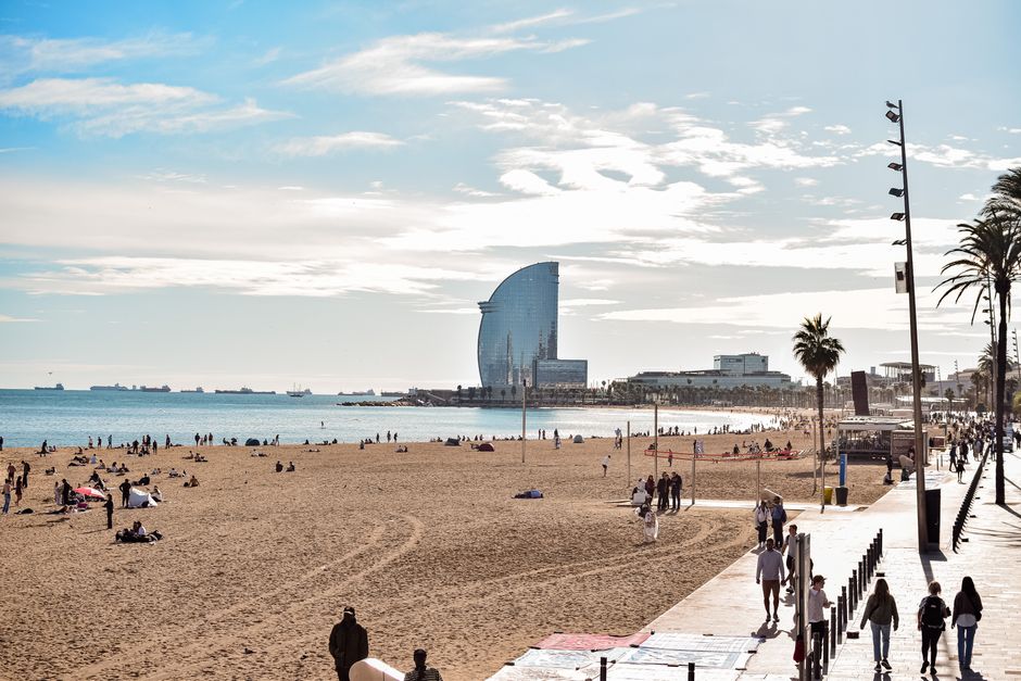 A hand holding a Barcelona Card, a city pass for attractions and transport in Spain
