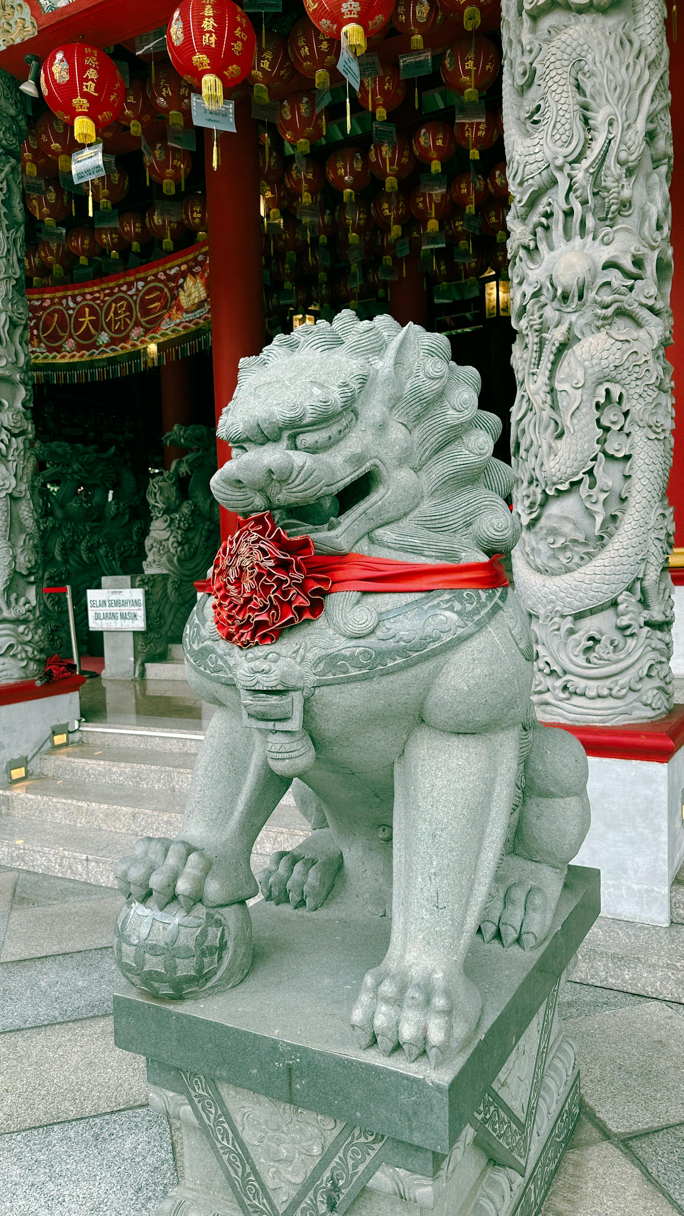 Snow-Covered Chinese Guardian Lion at Beijing Temple · Free Stock