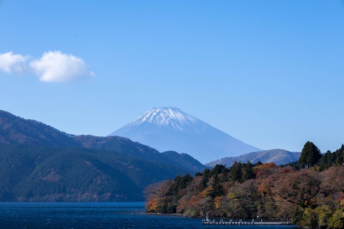 Volcanic steam vents at Owakudani in Hakone, Japan with mountains in the background