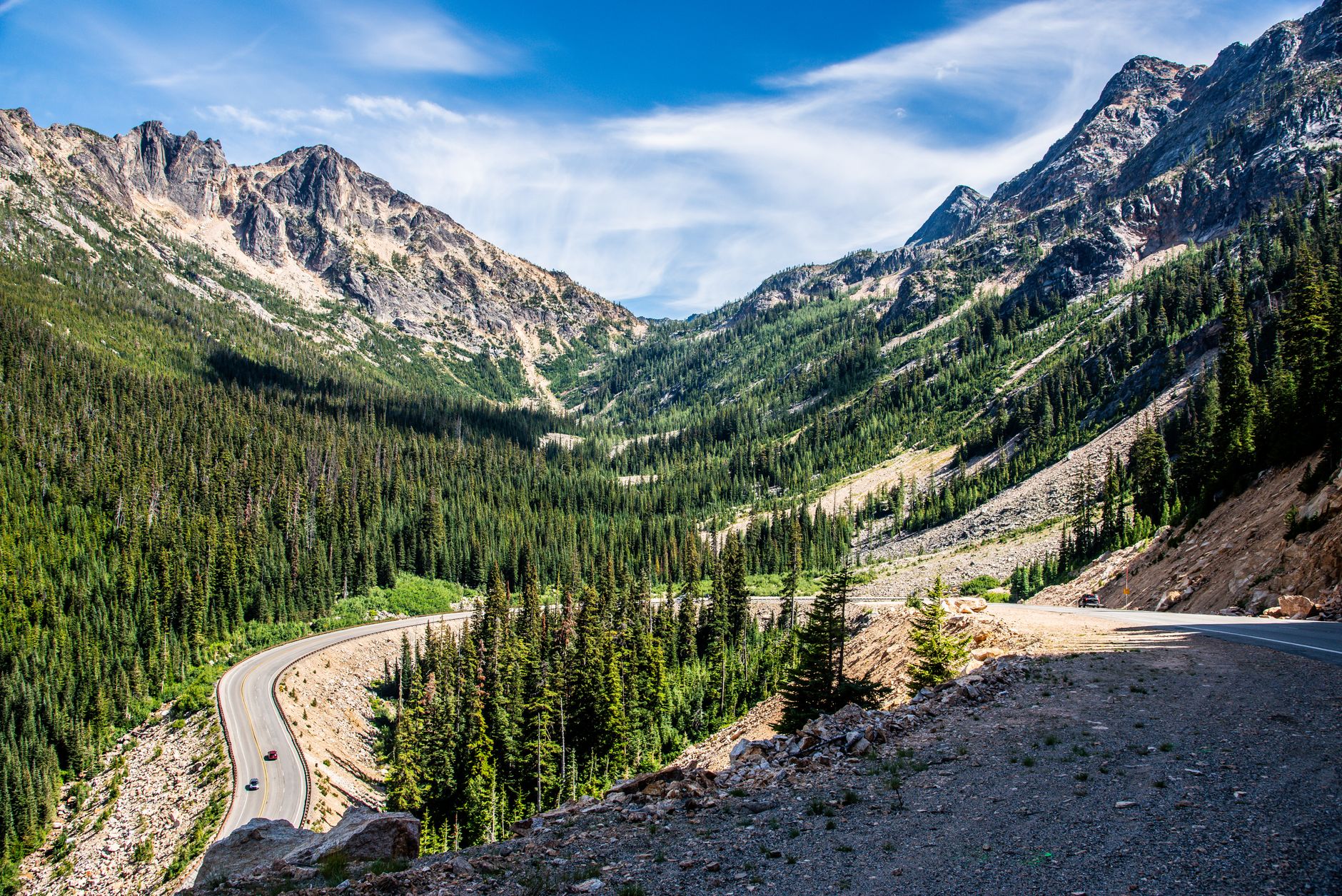 Breathtaking view of a winding highway through the Cascade Mountains in Washington, USA.