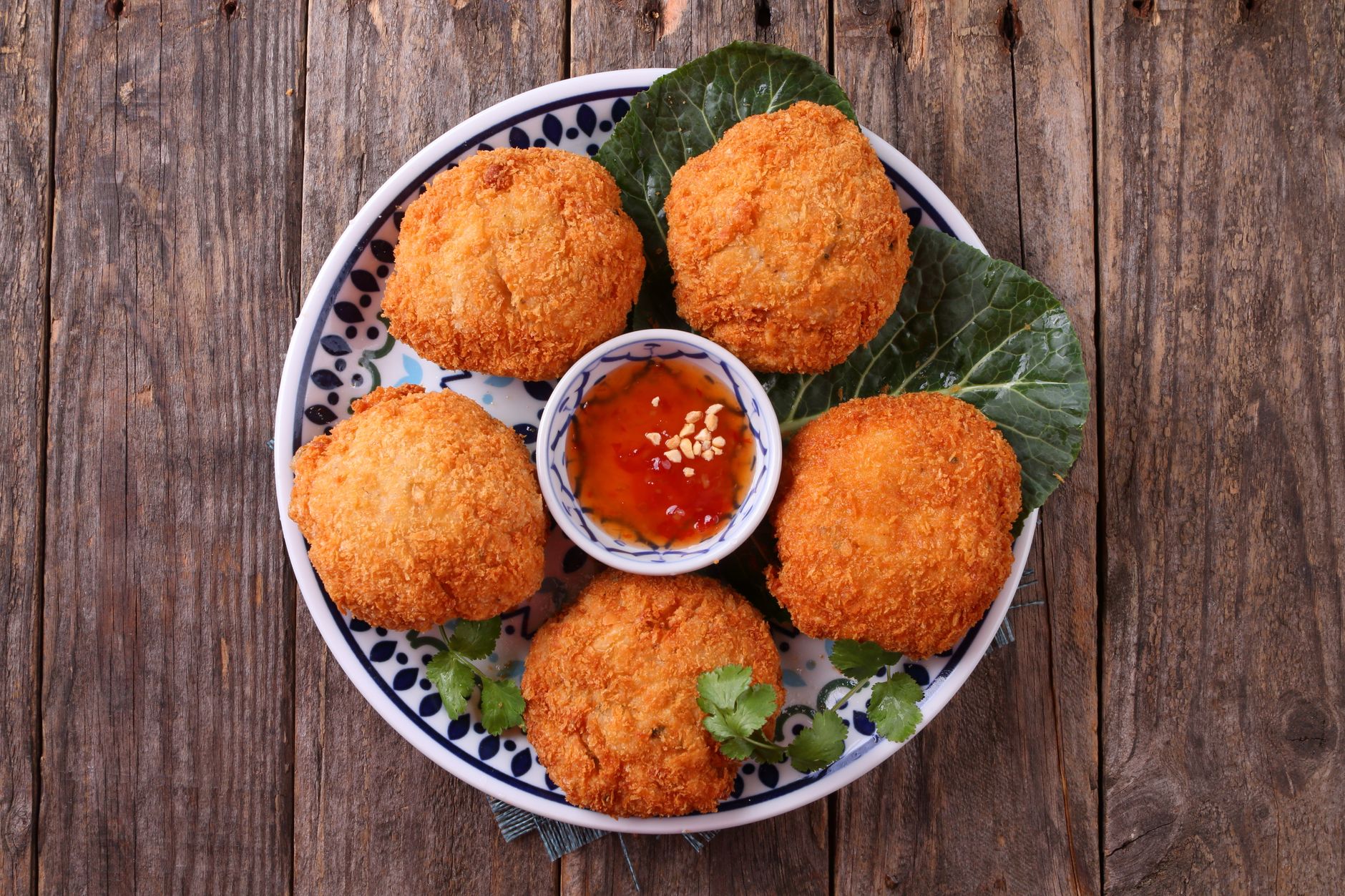 Close up of cooked steak bites with wooden skewers