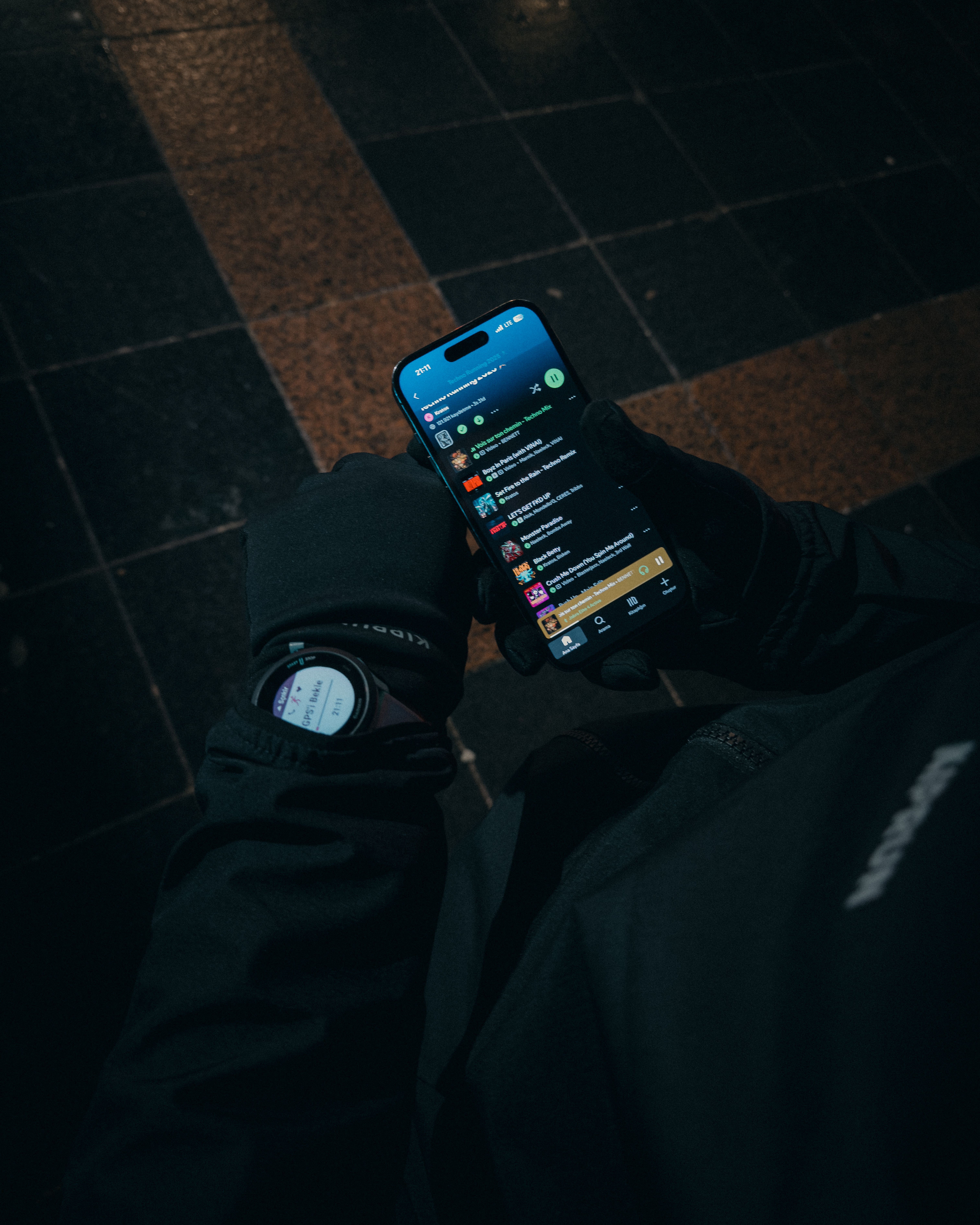 Person Using Smartphone with Gloved Hands Outdoors at Night · Free ...