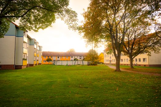Serene urban environment with autumn foliage in Lower Saxony, Germany.