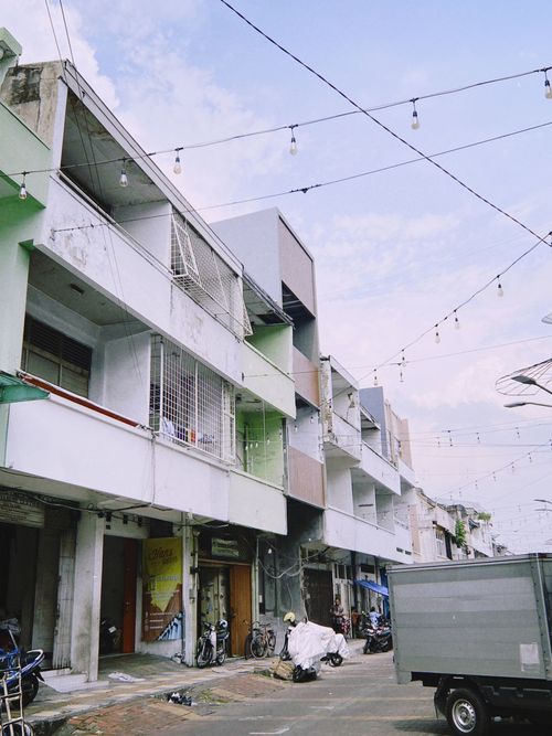 Free Charming street scene in Semarang with urban architecture and hanging lights. Stock Photo