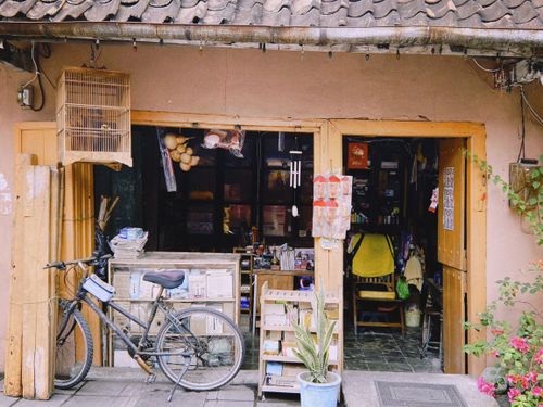 Free Vintage shop facade with a bicycle outside in Semarang, Central Java. Stock Photo