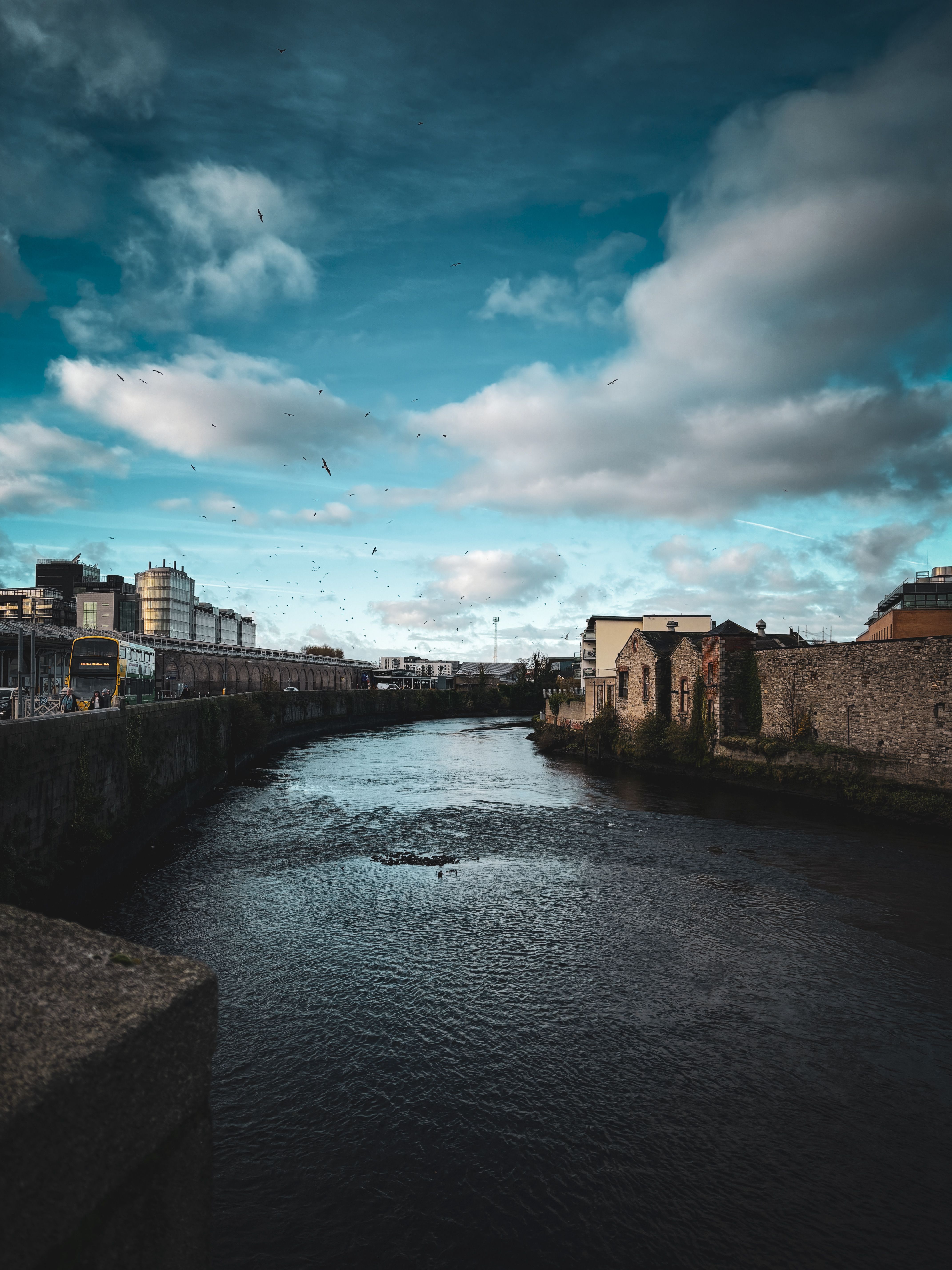 Scenic View of Dublin River with Historic Buildings · Free Stock Photo