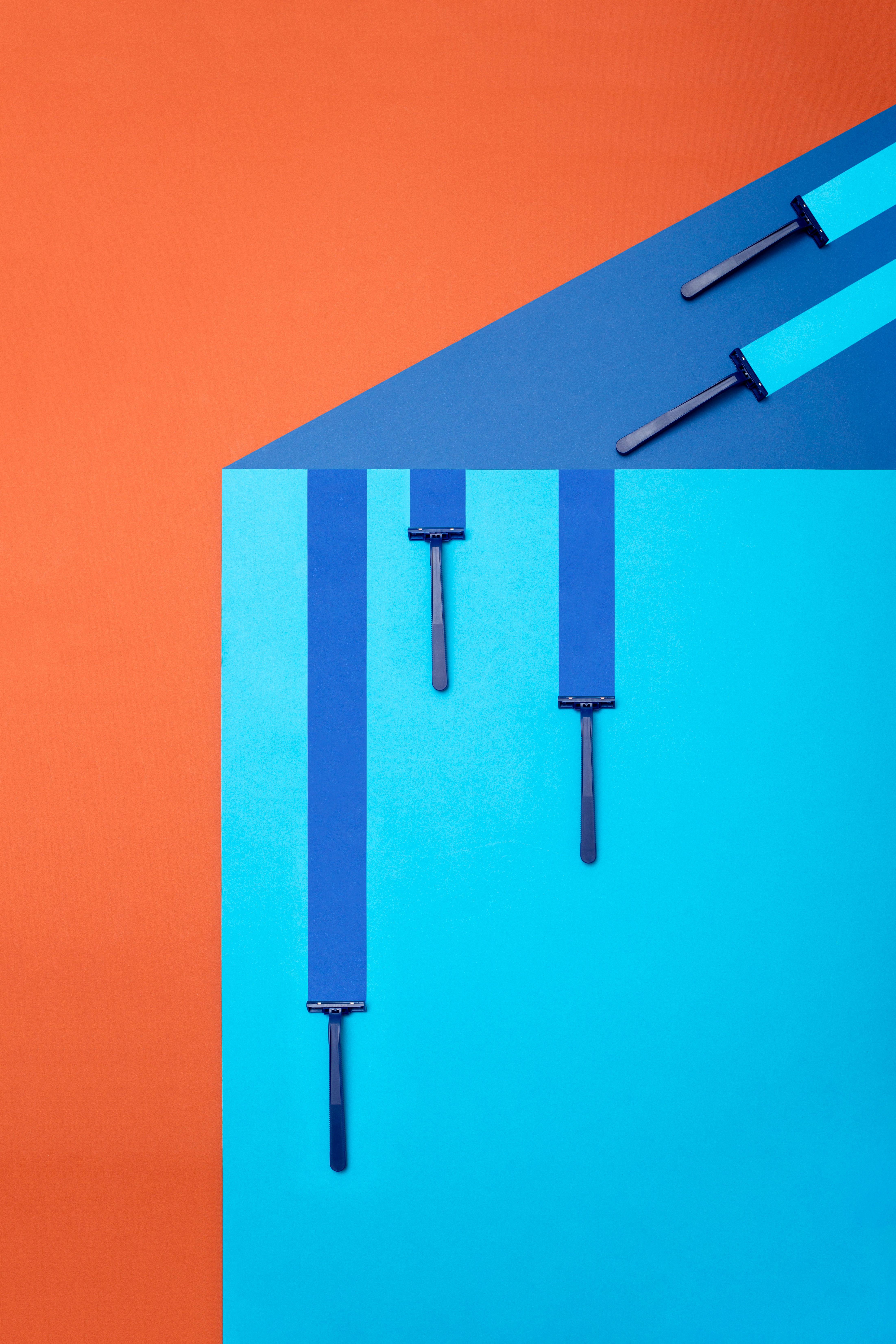 Abstract Minimalist Design with Razors on Colorful Background · Free ...