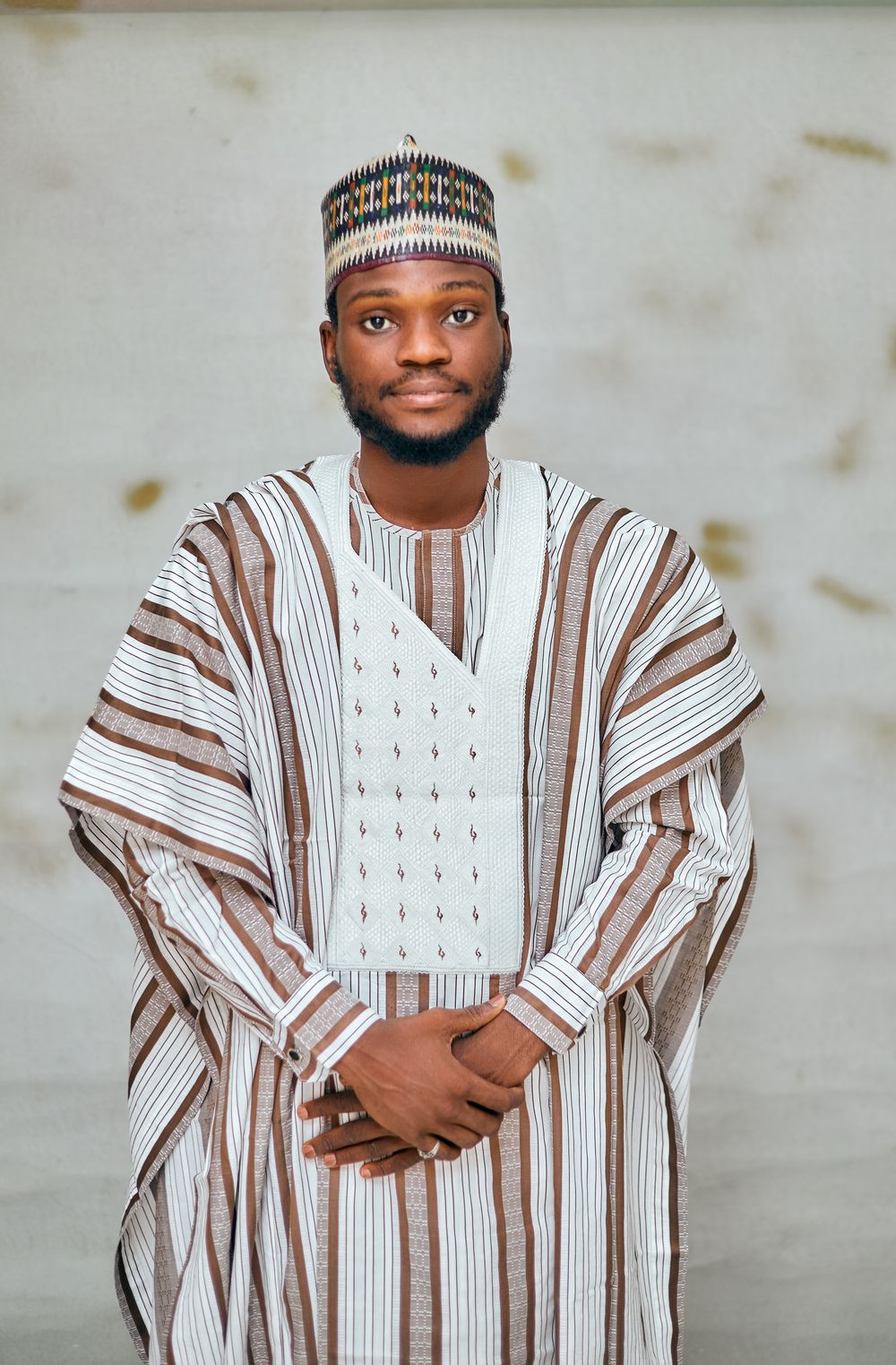 Portrait of a man in traditional Nigerian agbada