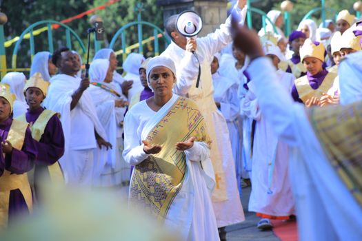 Orthodox Christian celebration in Addis Ababa, featuring traditional attire and cultural expressions.