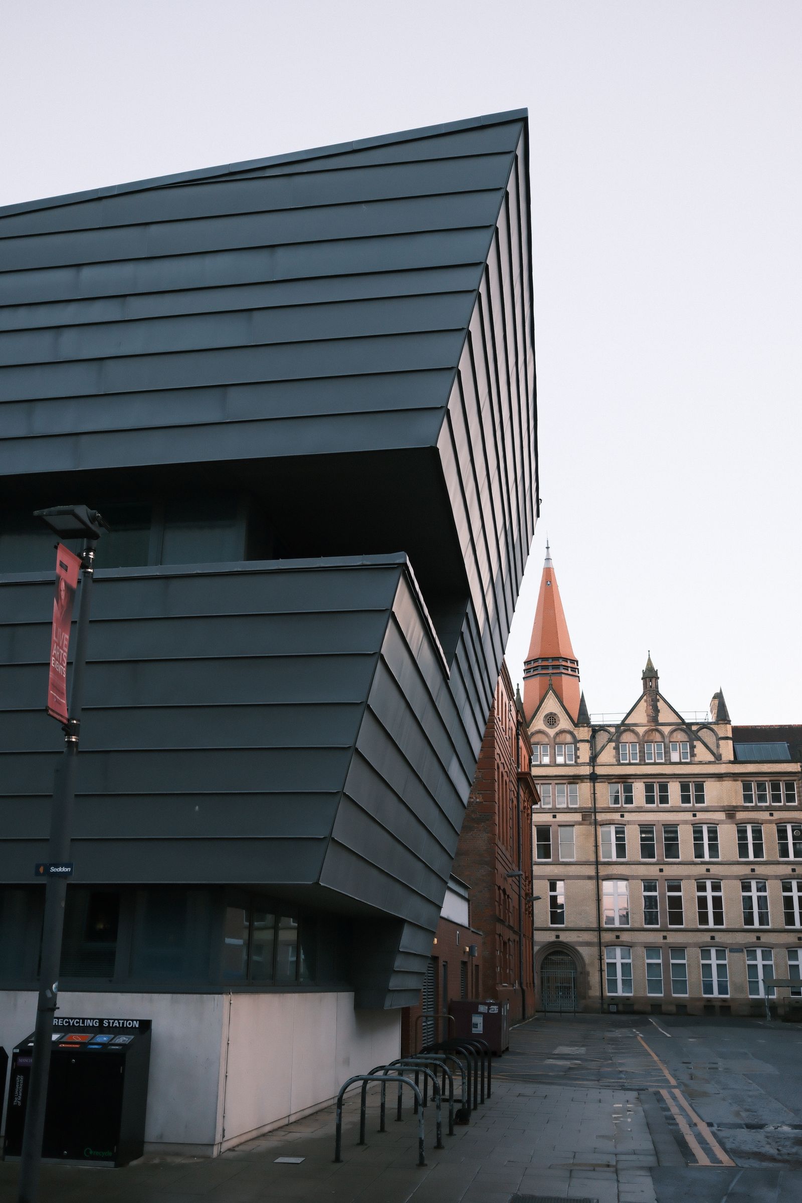 Nottingham Contemporary’s dark cladding against the Arkwright Building spire