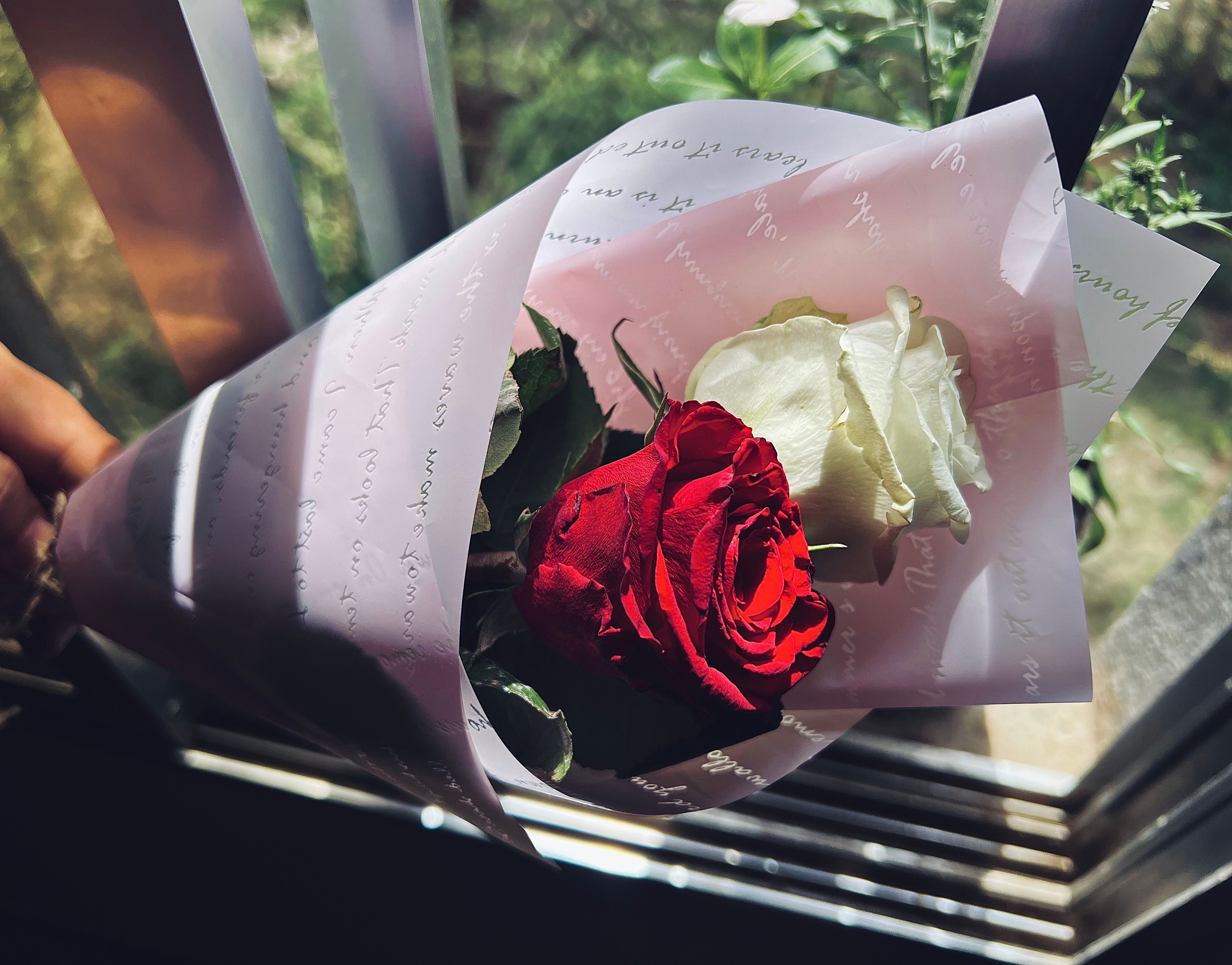 Elegant rose bouquet wrapped in kraft paper