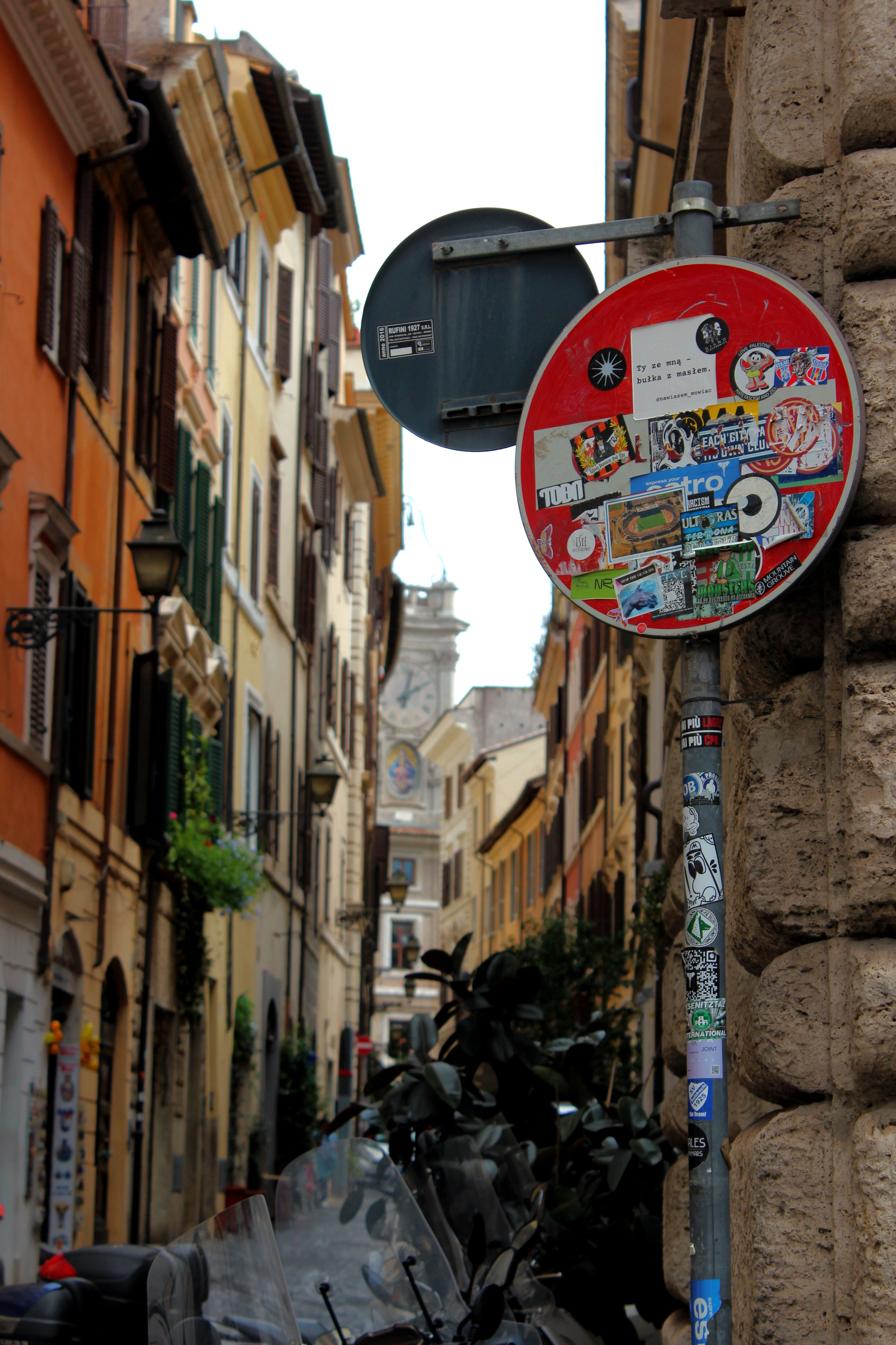 Colorful Italian Street with Graffiti Sign · Free Stock Photo