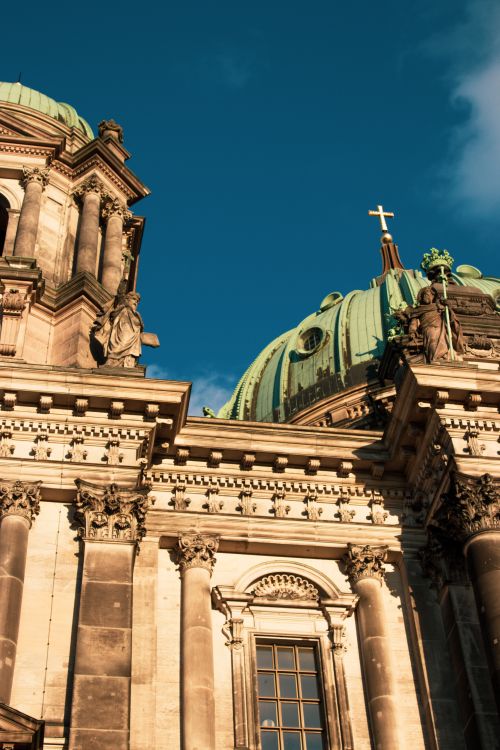 Free A striking view of the Berlin Cathedral's dome under a clear blue sky, showcasing its architectural beauty. Stock Photo
