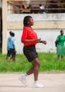 Female Referee in Action at Outdoor Sports Event