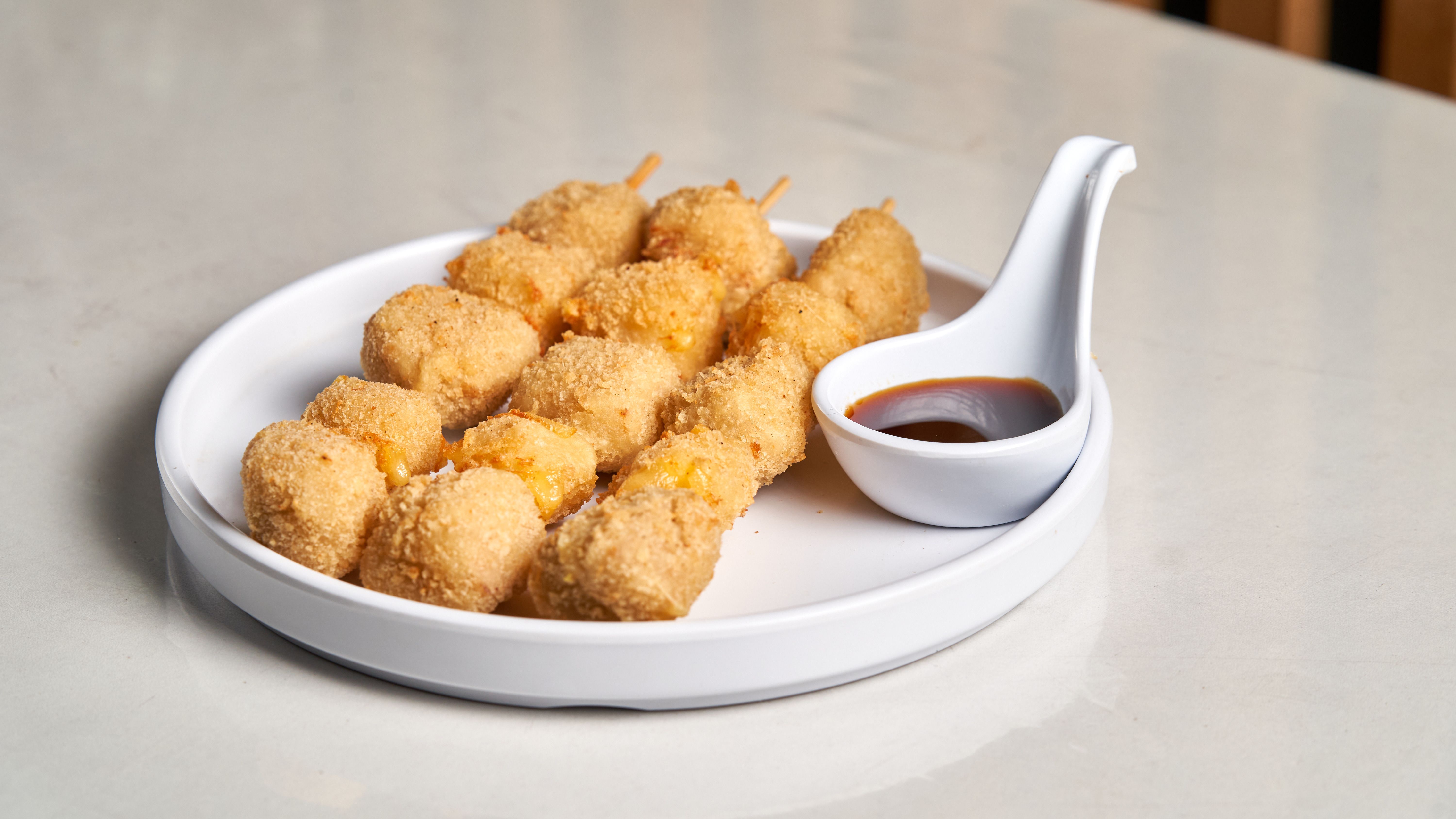 Mango dipping sauce served with masala corn dogs