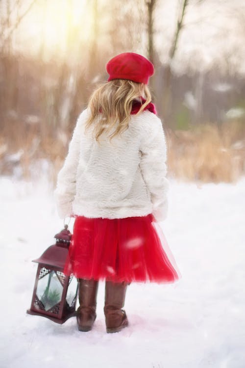 Woman Walking Holding Lantern