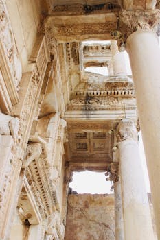 Detailed view of the ancient Roman ruins in İzmir, showcasing intricate carvings and pillars.