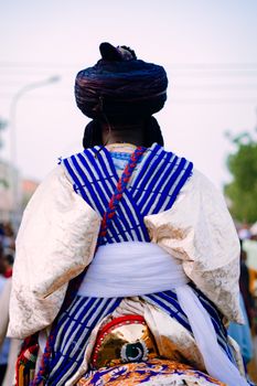 A vibrant cultural parade showcasing traditional attire and customs.