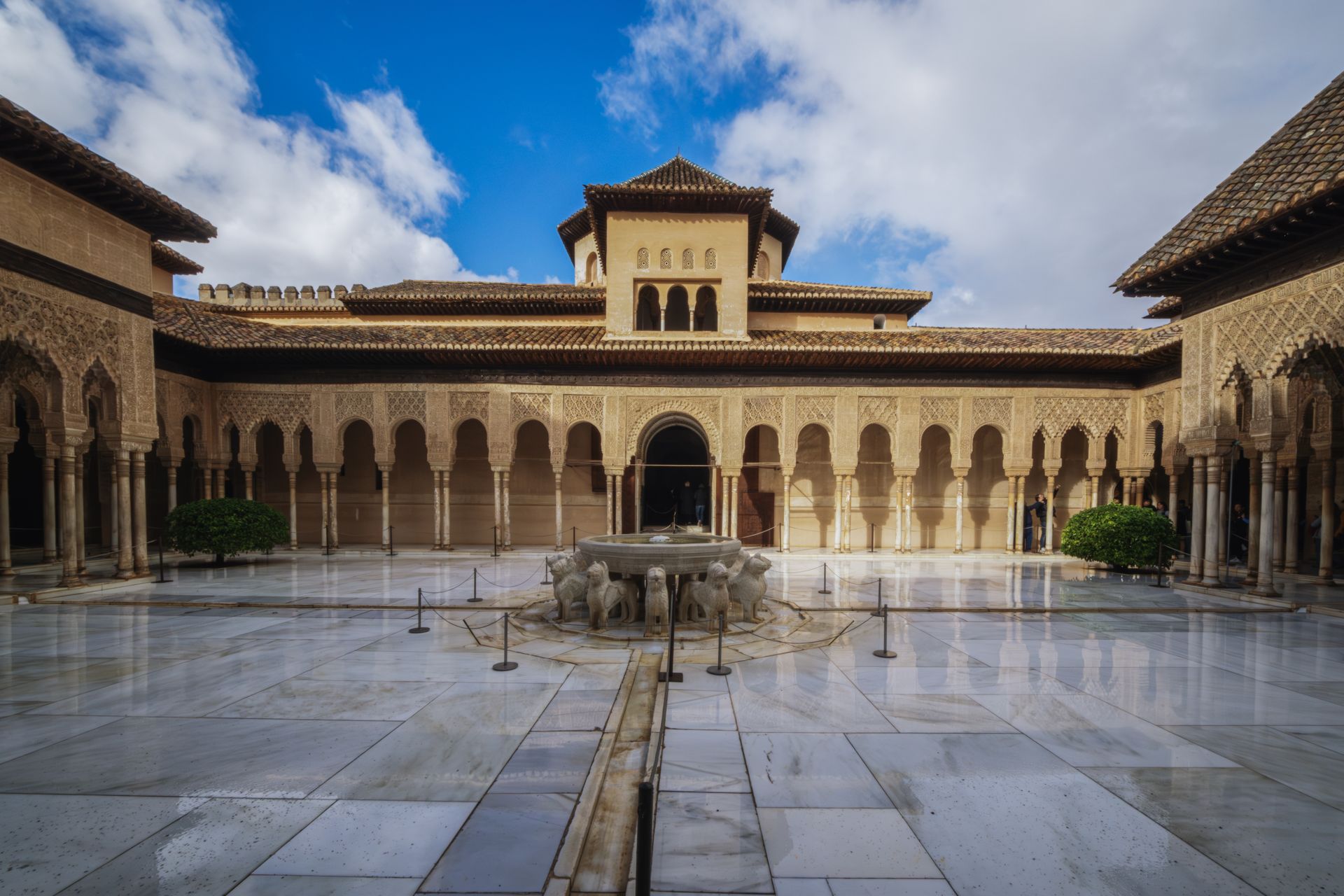 Interior courtyard architectural details of the Alhambra Palace in Granada during daytime